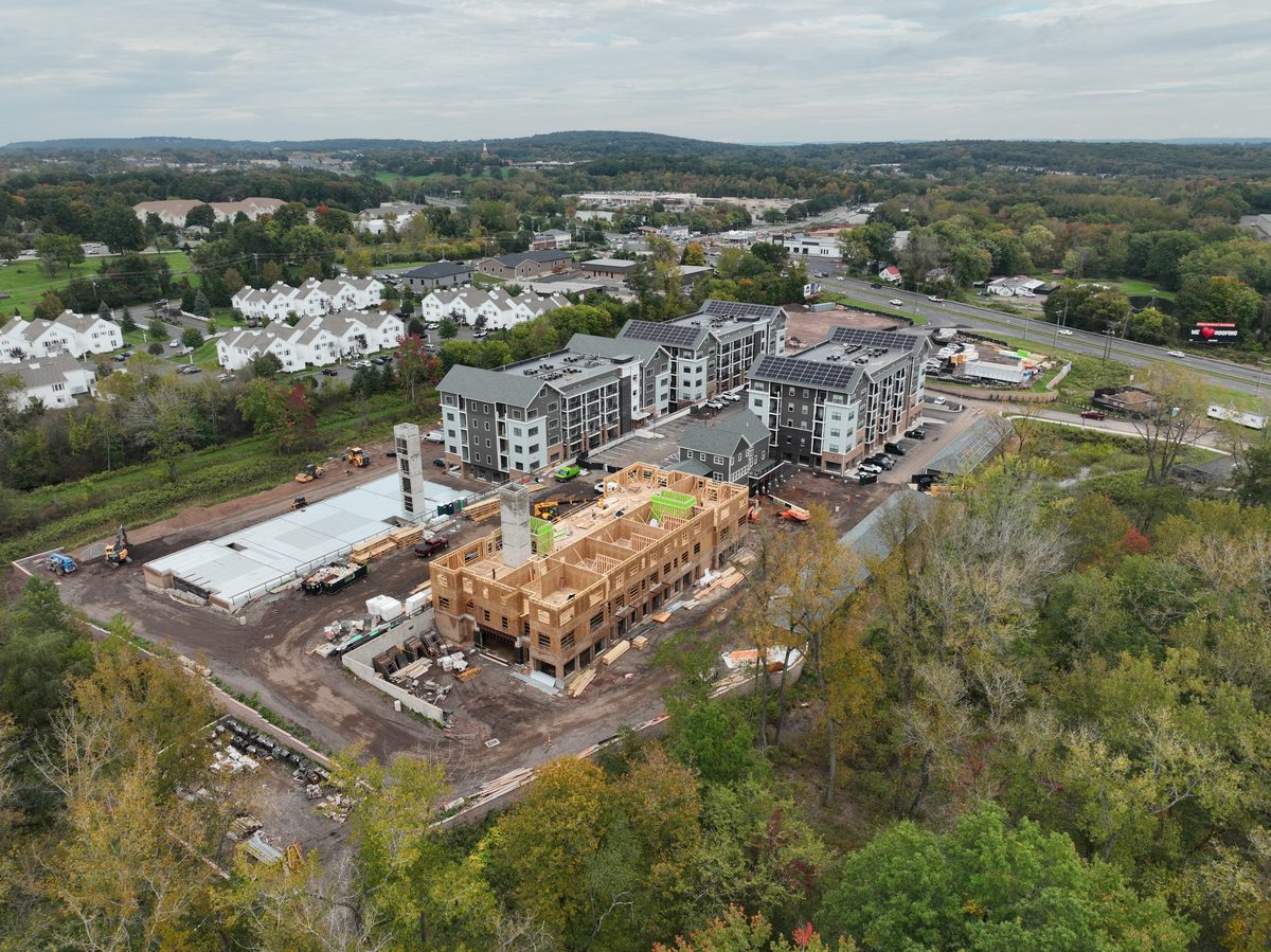 The same east elevation three weeks later with framing advanced