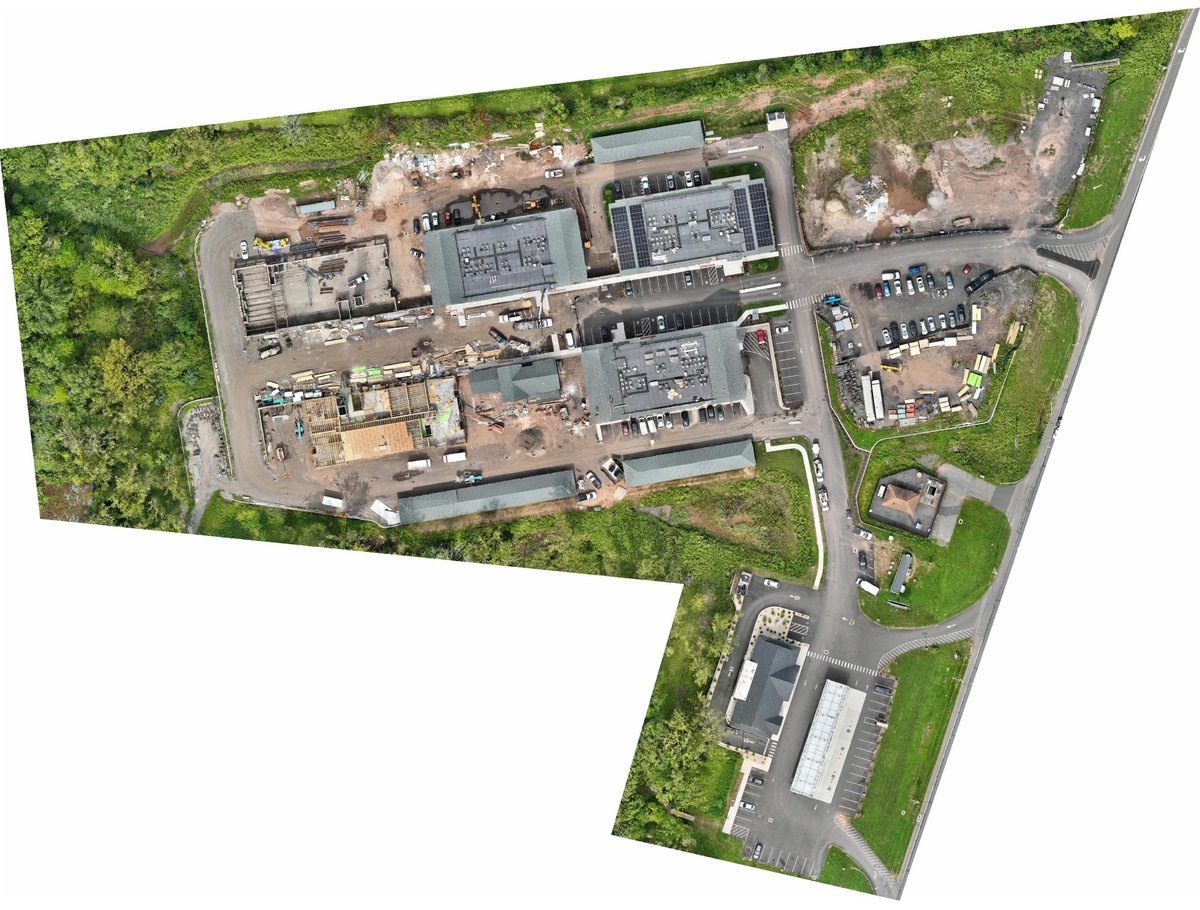Processed orthomosaic, a geometrically corrected top-down map of a multifamily construction site