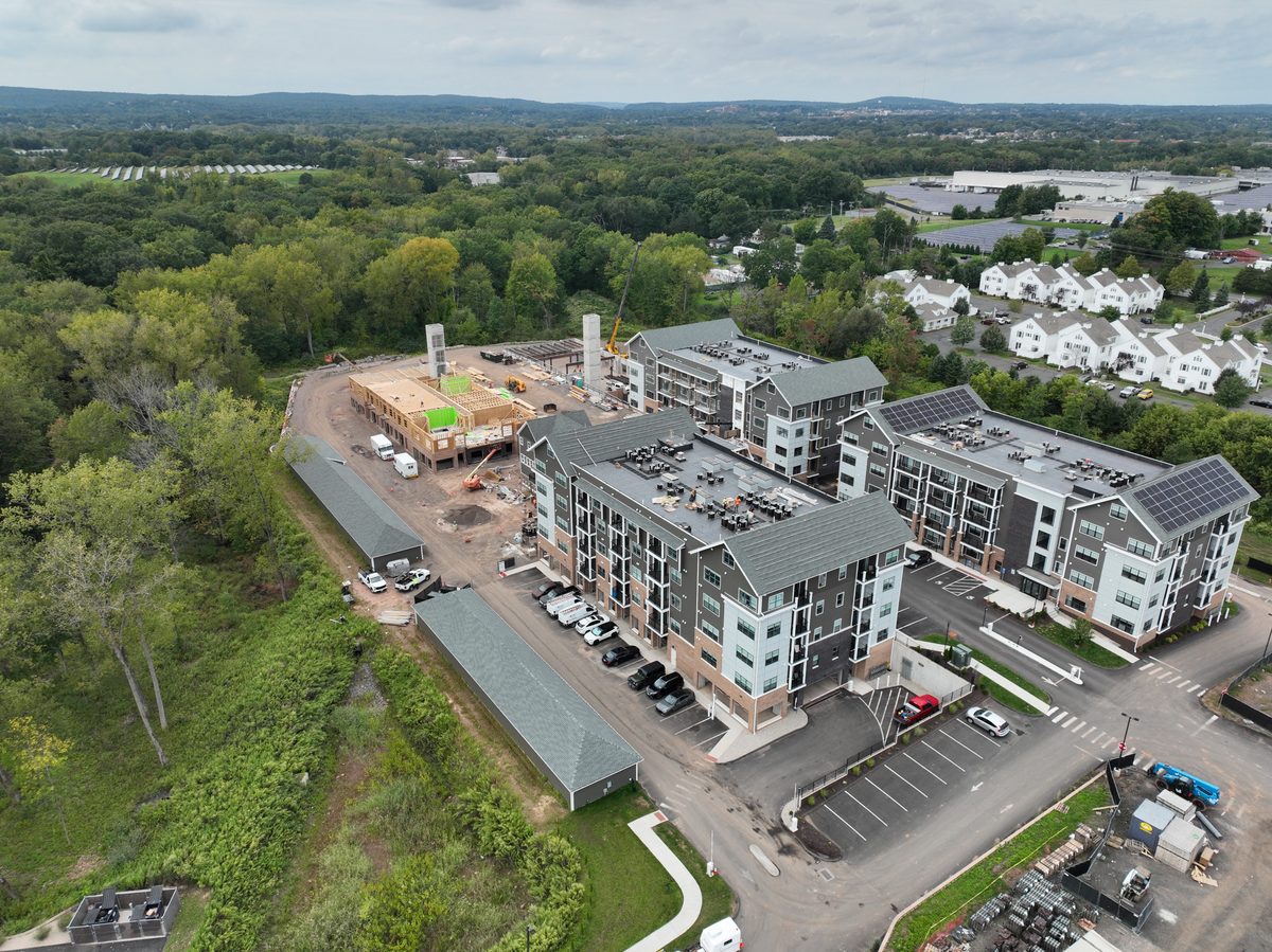 Wide aerial overview of a full construction site
